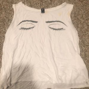white tank top with eyes